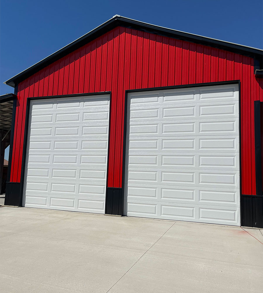 Classic raised panel steel garage door for a barn house
