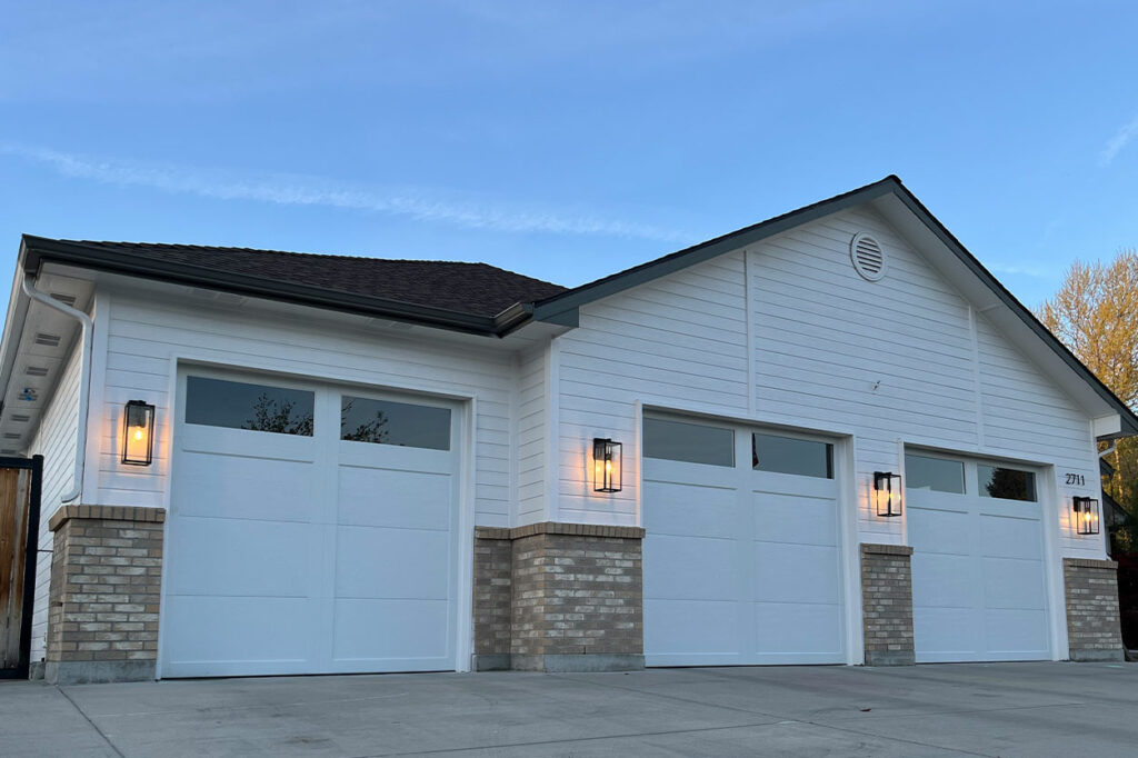 Juston Eppler Home Garage Door, a classic modern carriage door with a white painted finish